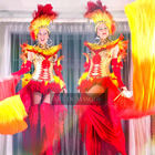 Sun Flame Goddesses on Stilts